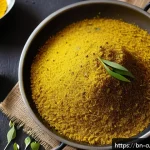 Home 23 비건 요리에서의 특별한 풍미 조화 방법 - A vibrant, close-up composition of fresh Bengali kitchen ingredients featuring cumin powder being ge...